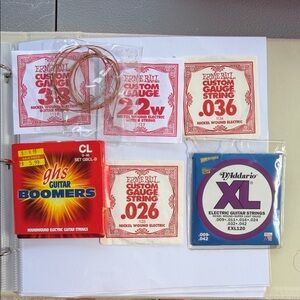 Guitar String Set with D'Addario and Ernie Ball
